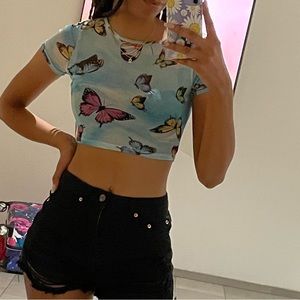 Fashion Nova blue mesh butterfly top.